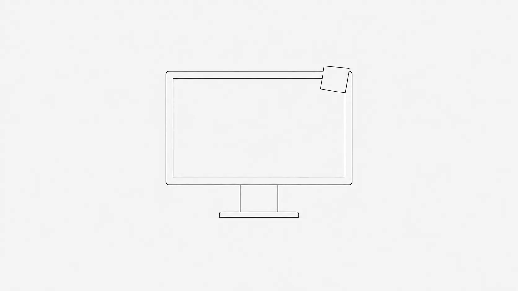 A desktop monitor on a stand with a single small square note stuck to the top corner of its frame